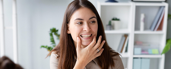 Woman learning a facial expression