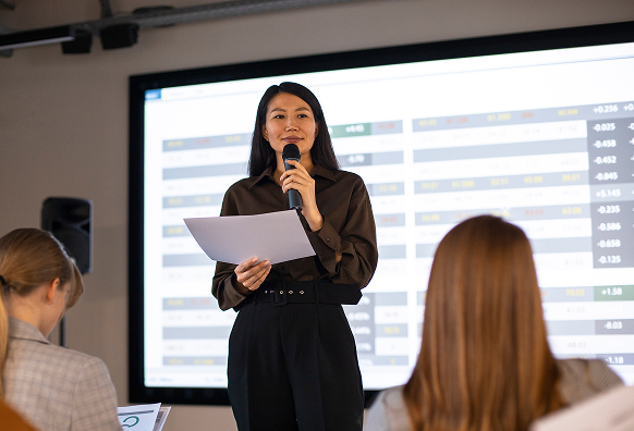 A woman giving a corporate presentation